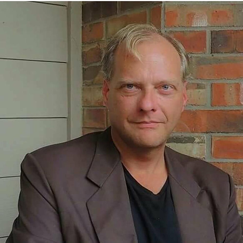 Mark A. White